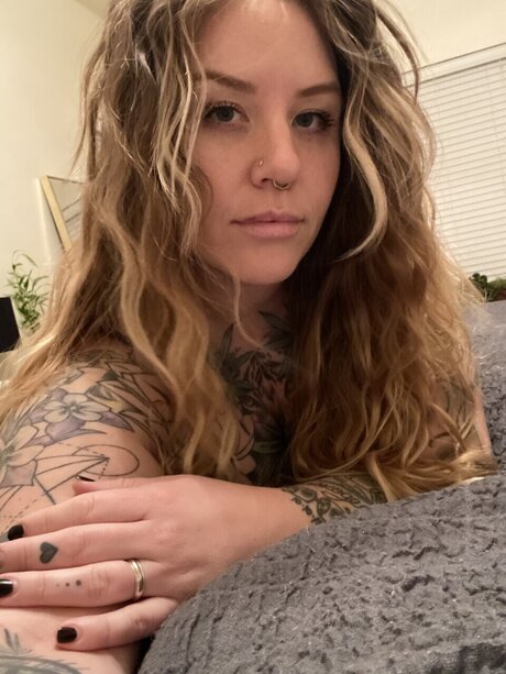 Naakte gelekte OnlyFans-foto van Tangerine